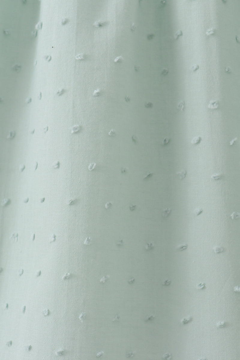 Green swiss dot cross sheep ruffle dress