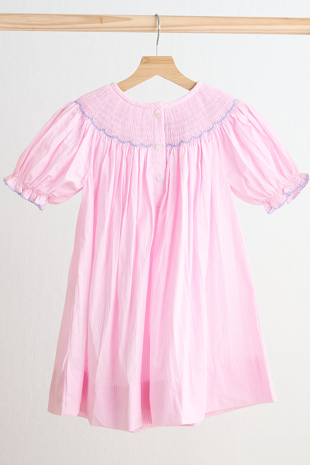 Pink alpaca hand smocked gingham dress