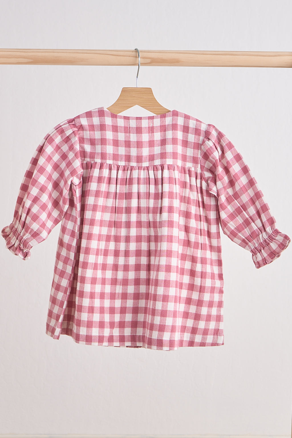 Pink gingham flannel bow dress